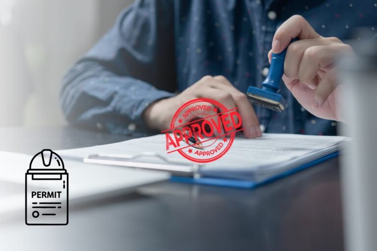 Safety officer reviewing a Work Permit before hazardous work begins